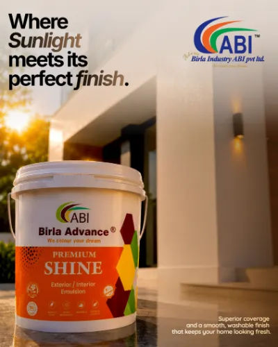 ABI post: “Where sunlight meets its perfect finish.” A Birla Advance Premium Shine pack outside a modern home at sunset.